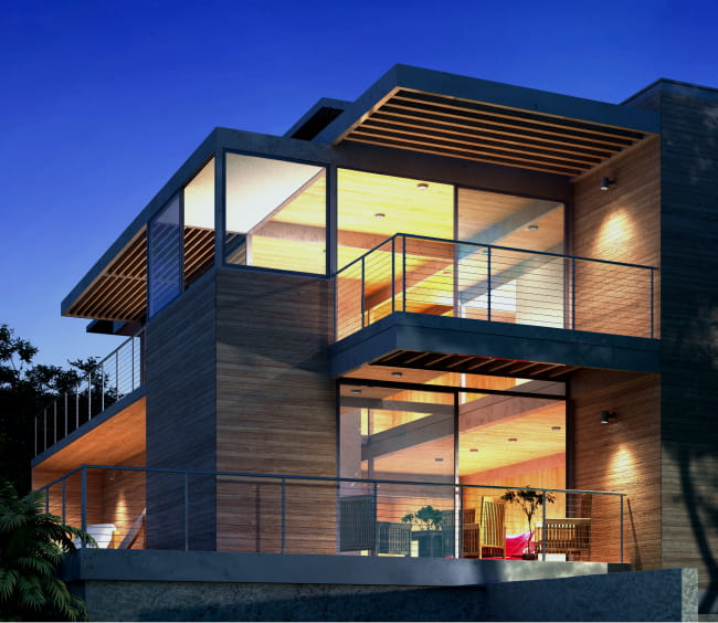 バルコニーとその手すりが特徴のモダンな住宅の外観